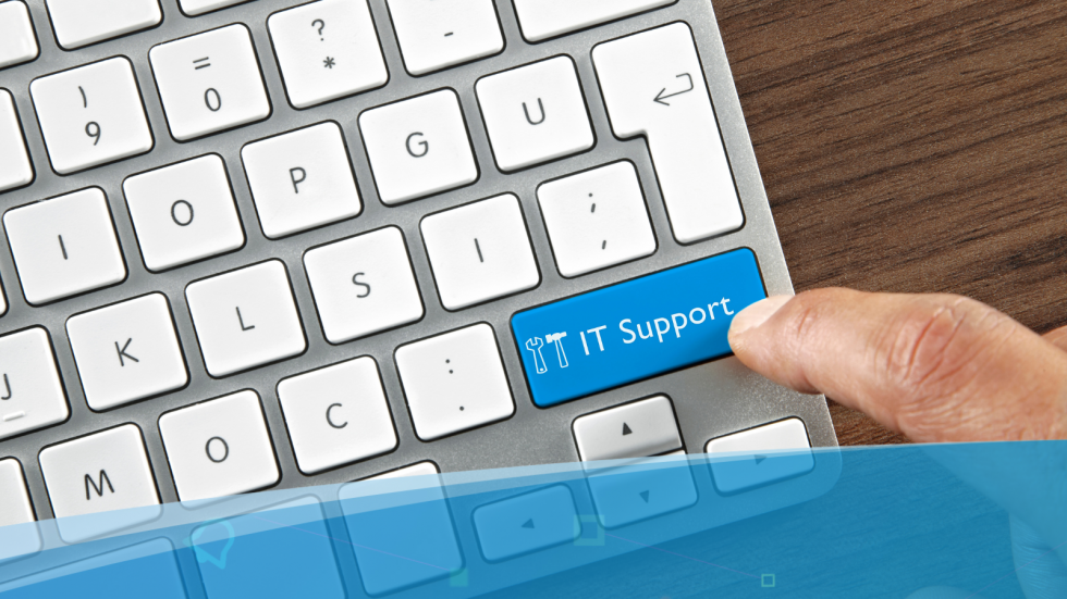 Touching an IT Support button on a keyboard