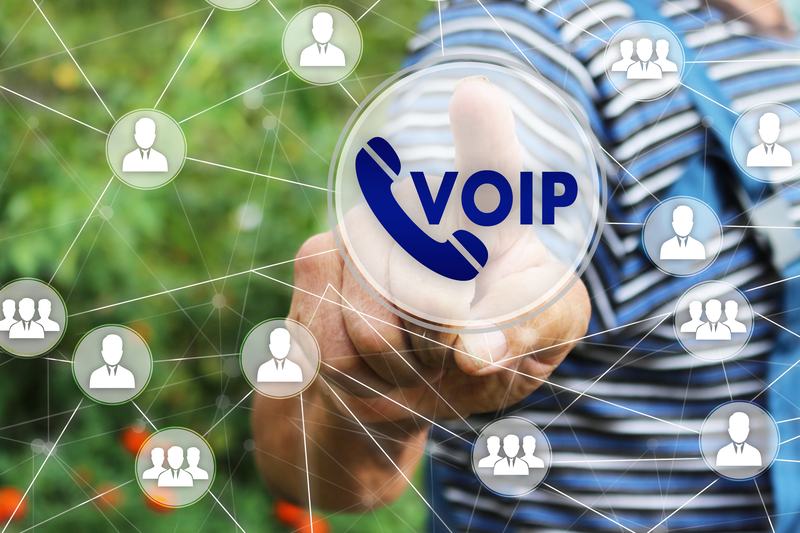 Man pointing at VoIP Systems