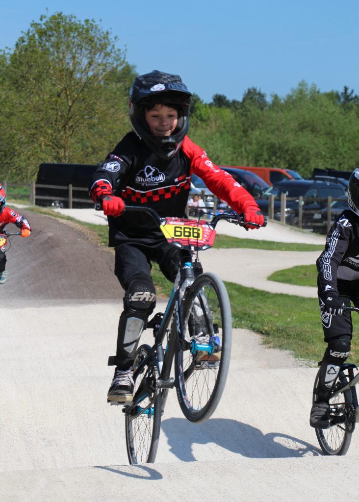 Child mid BMX race